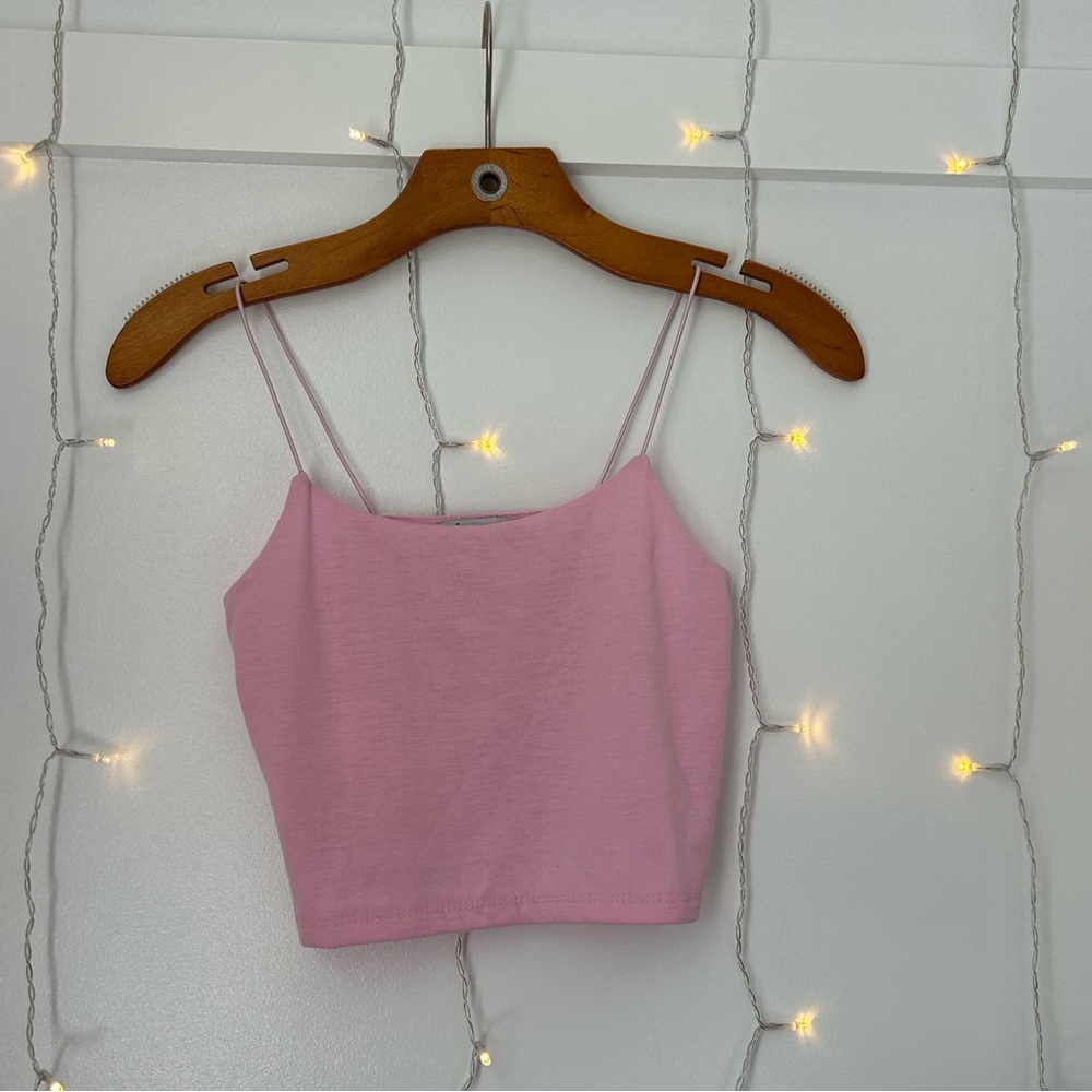 A pink cropped tank